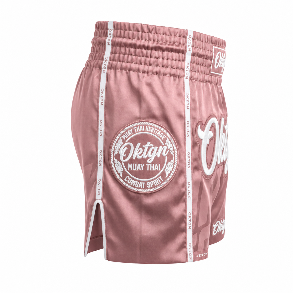 Short Muay Thai OKTAGON rose profil droit medaillon brode