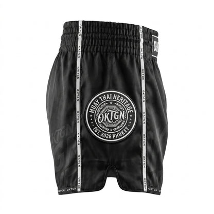 Short Muay Thai OKTAGON noir profil gauche medaillon brode